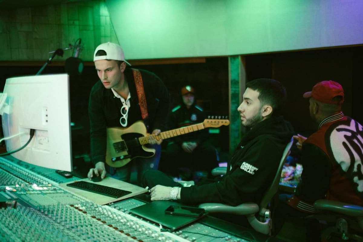 GRAUX coaching a producer in a studio session